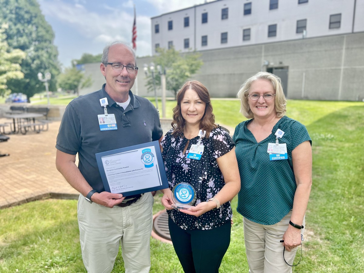 Bluegrass team standing with Chest Pain Accreditation award